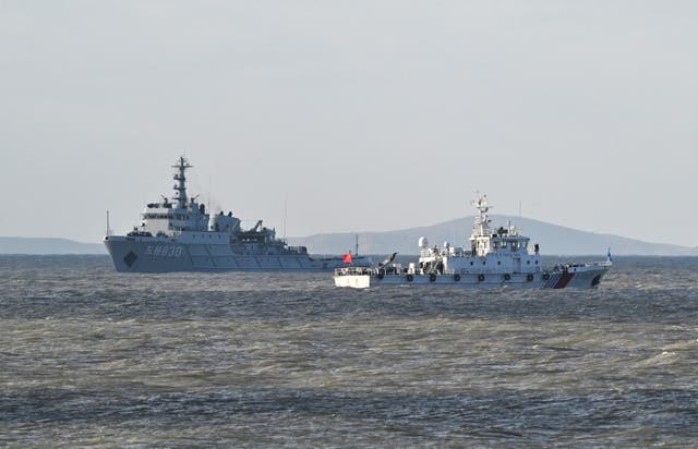 <p>Chinese ships patrol as the People's Liberation Army (PLA) conduct military drills on Pingtan island, in eastern China's Fujian province, the closest point to Taiwan, on 0 December 2025</p>