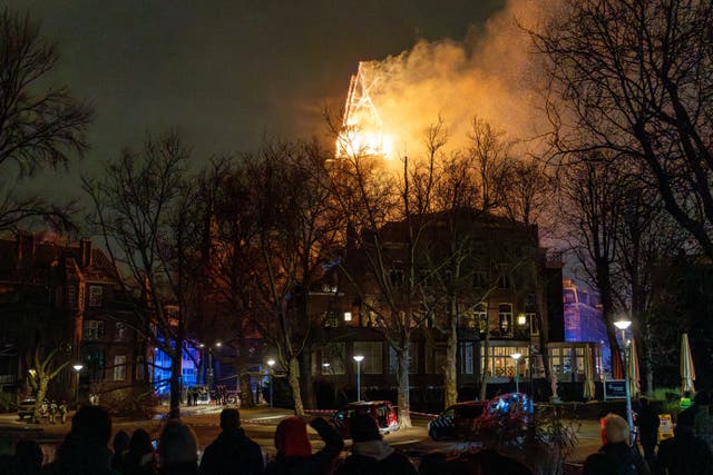 <p>The neo-Gothic Vondelkerk, near the city's central Vondelpark, is seen on fire on New Year’s Day</p>
