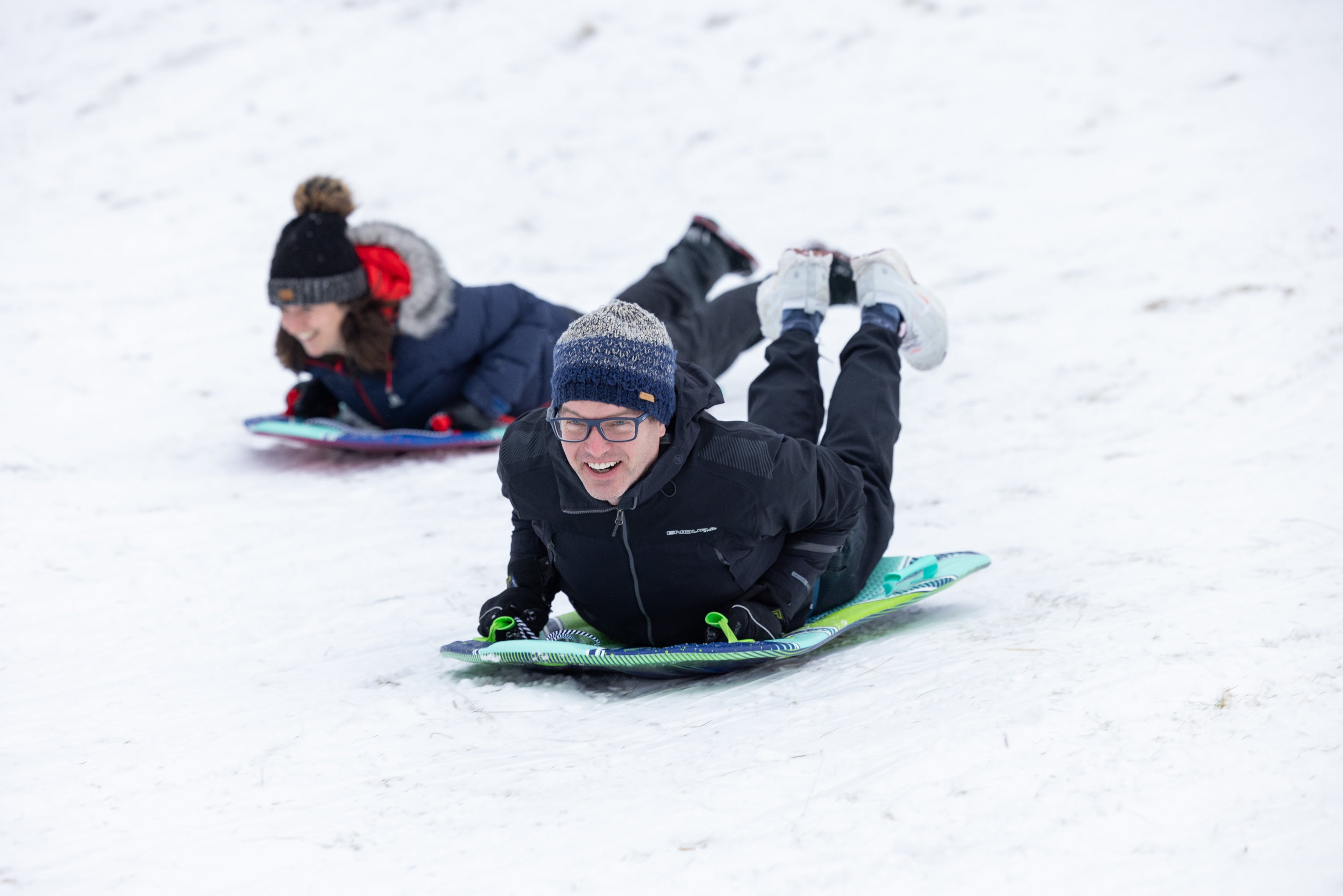 People sledging in Loch Morlich, Aviemore (Paul Campbell/PA Wire)