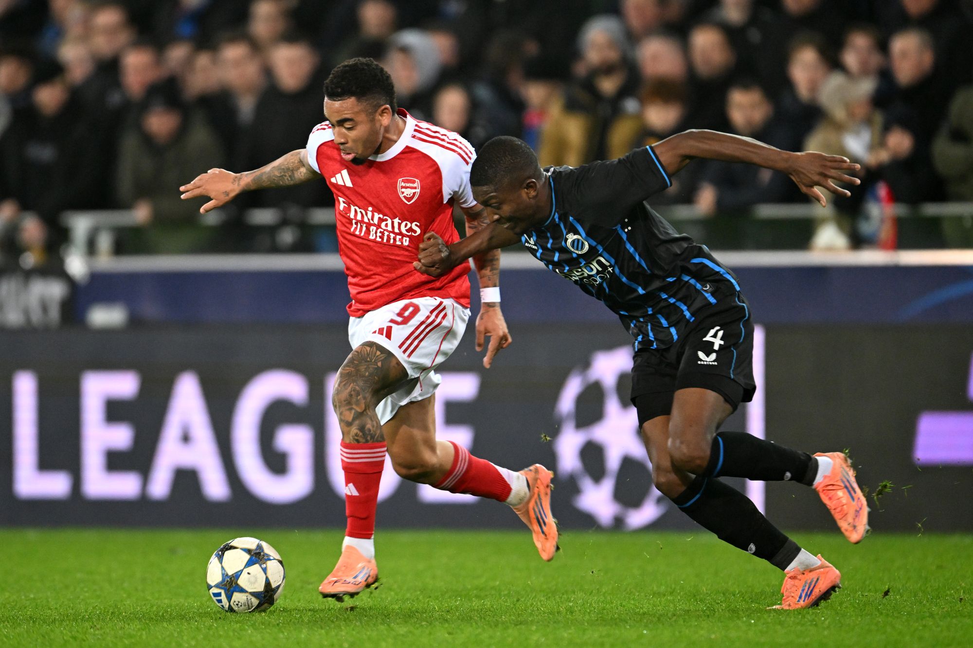 Gabriel Jesus of Arsenal is challenged by Joel Ordonez of Club Brugge
