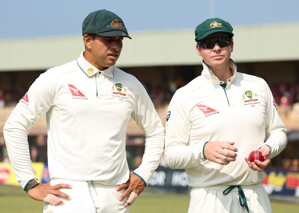 Steve Smith (right) insists he won't follow Usman Khawaja into retirement