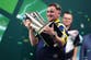 Luke Littler writes name among darts greats with stunning World Championship win over Gian van Veen