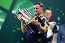 Luke Littler writes name among darts greats with stunning World Championship win over Gian van Veen