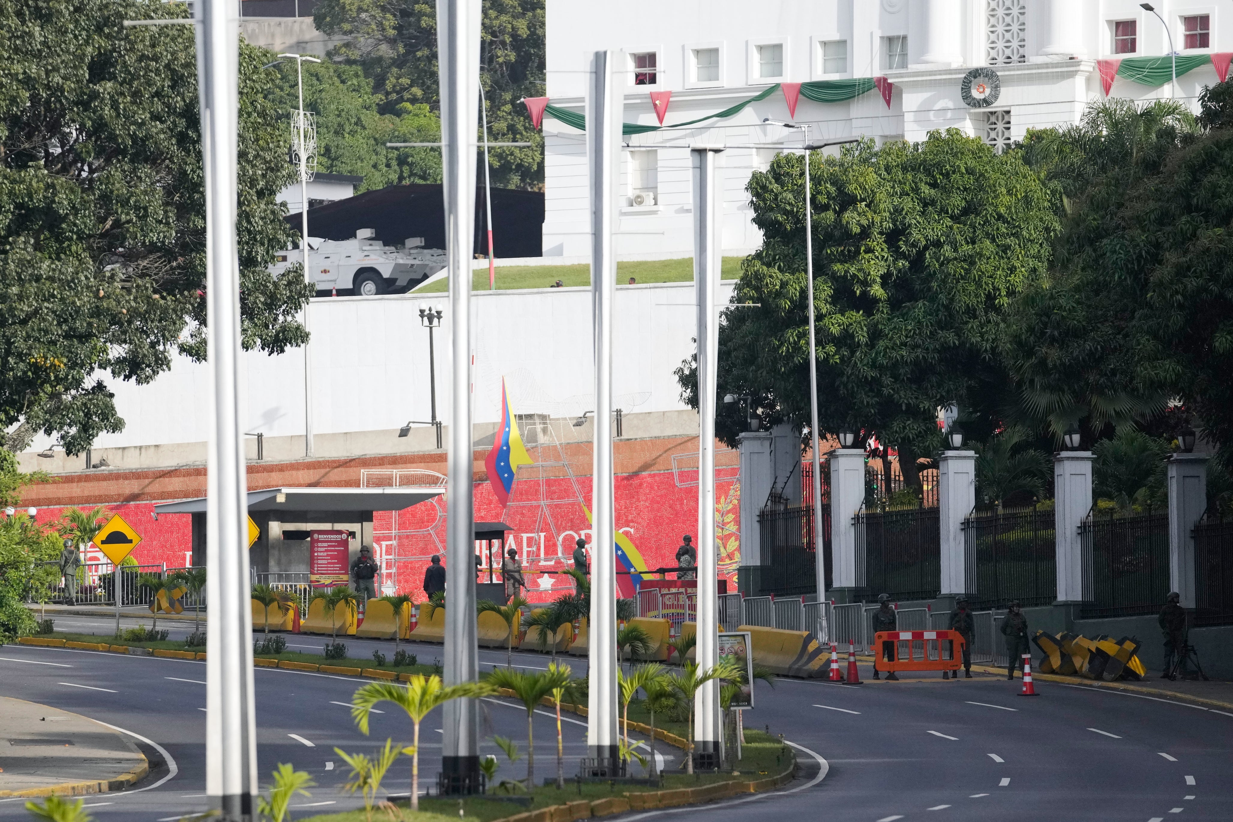Presidential guard troops stand outside the Miraflores presidential palace in Caracas, Venezuela