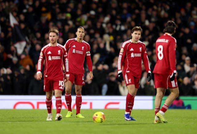 <p>Liverpool's Virgil van Dijk reacts after Fulham's Harrison Reed scored</p>