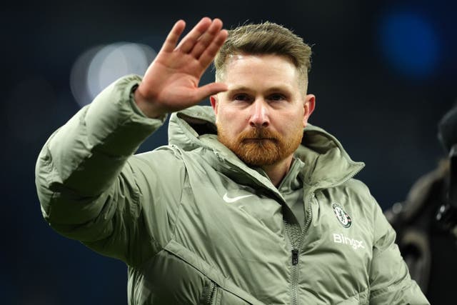 Calum McFarlane salutes the fans after the game (Martin Rickett/PA)