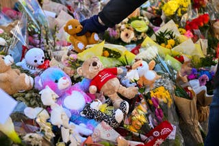Teddy bears are laid as the investigation continues into the deadly New Year's Eve fire at Le Constellation bar on 3 January 2026 in Crans-Montana, Switzerland