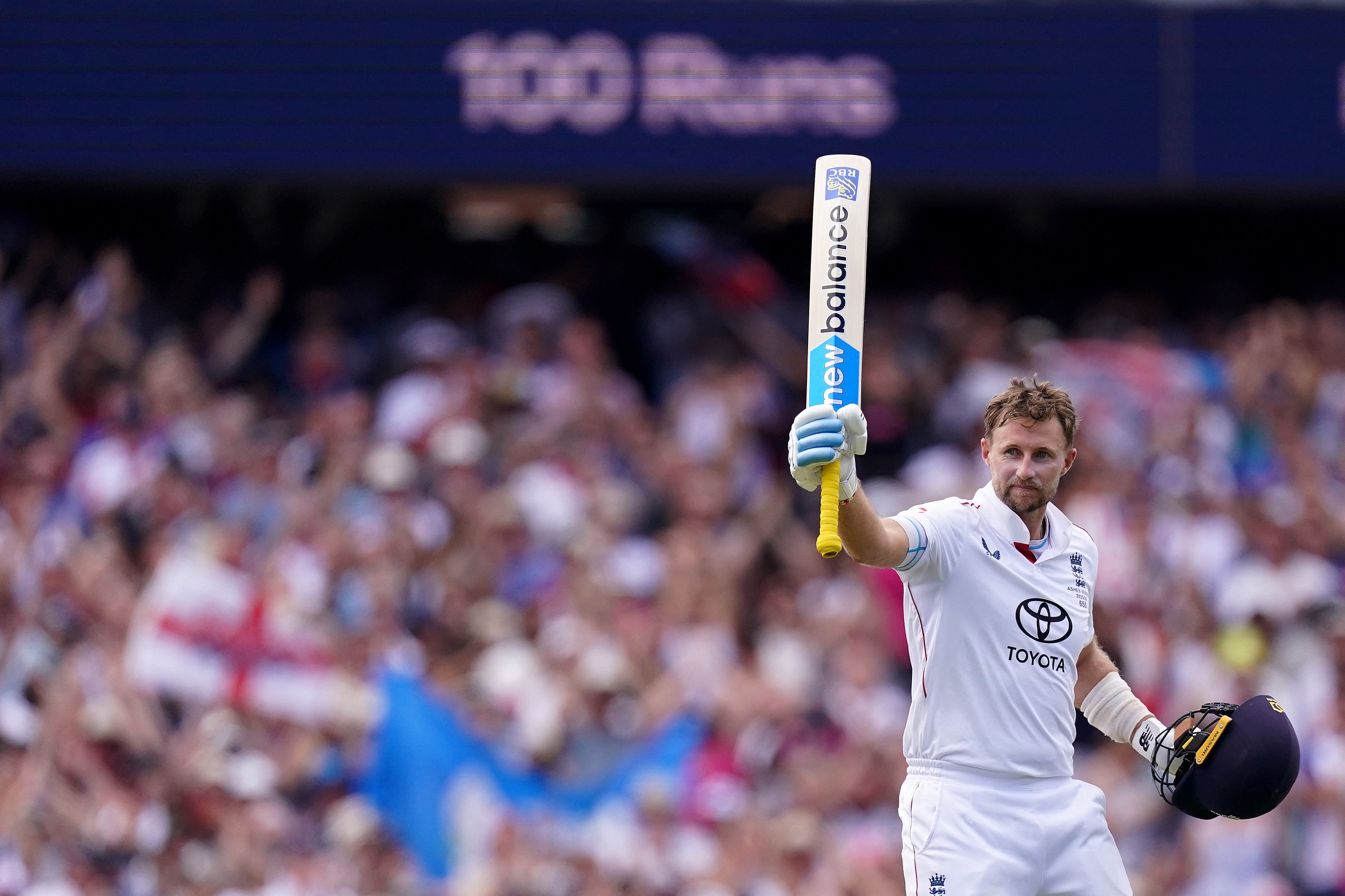 <p>Joe Root celebrates his century (Robbie Stephenson/PA)</p>