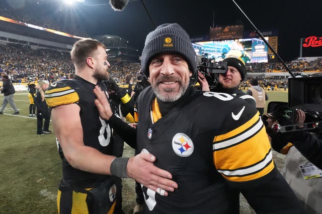<p>Pittsburgh Steelers quarterback Aaron Rodgers celebrates reaching the playoffs</p>