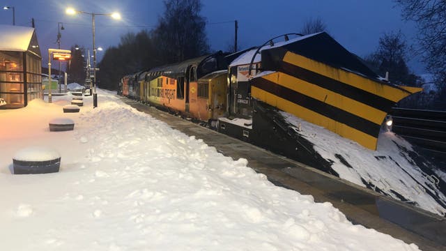 <p>Ploughing on: Network Rail snowplough at Keith station in northern Scotland</p>