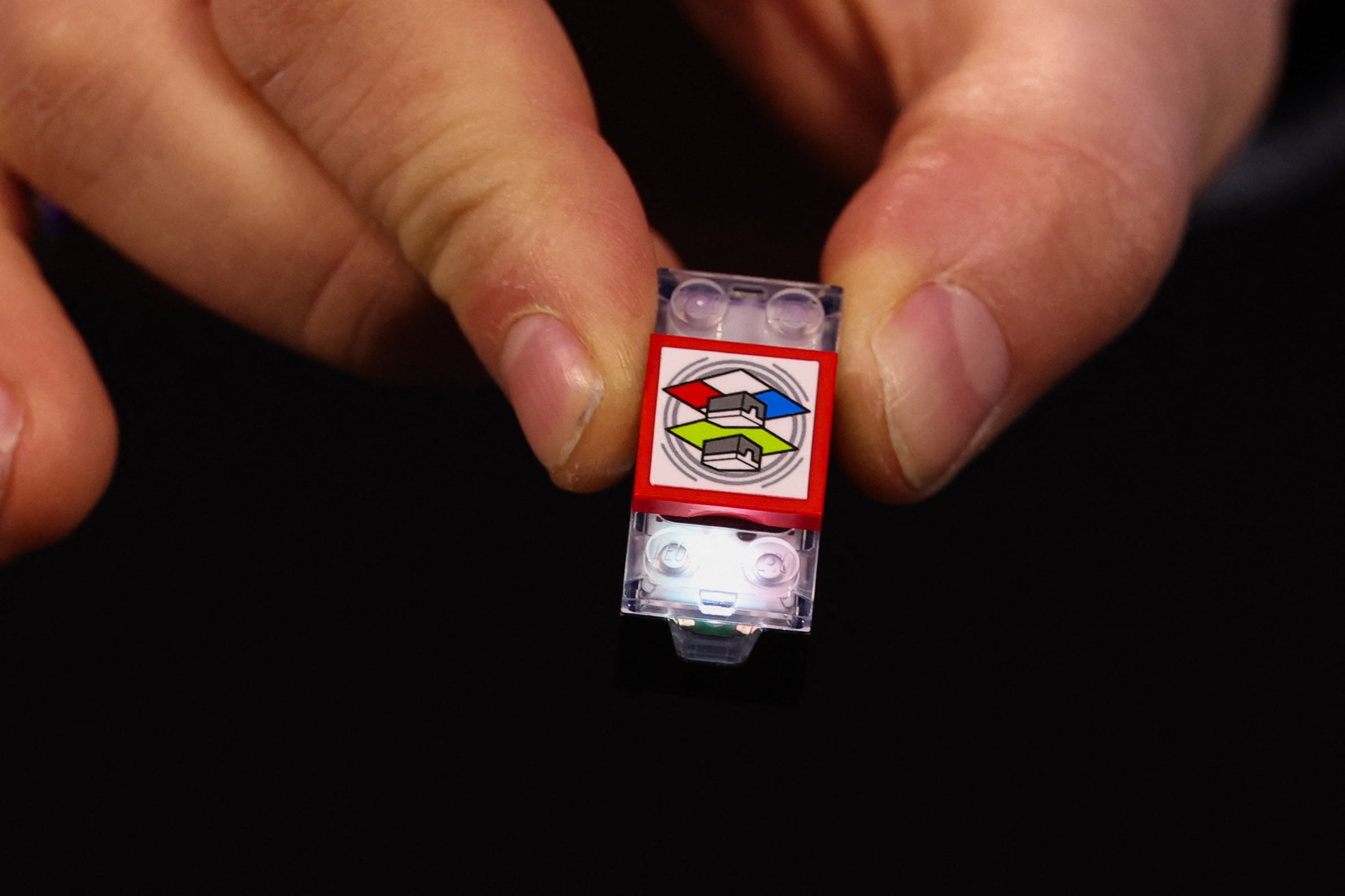 <p>The LEGO SMART Brick is demonstrated during the LEGO press conference on January 5, 2026. (Photo by Patrick T. Fallon / AFP via Getty Images)</p>