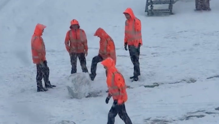 Airport workers have snowball fight amid Amsterdam travel chaos