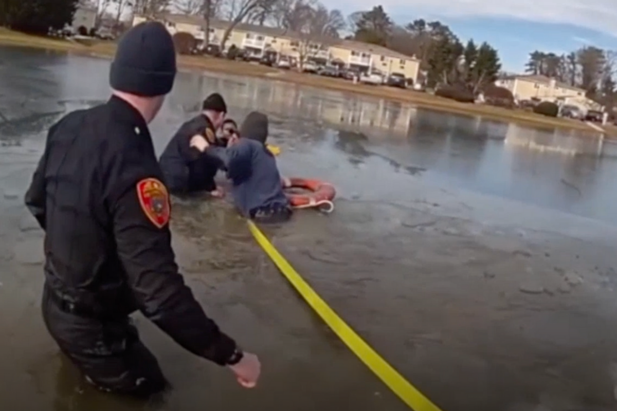 Dramatic video shows rescue of eight-year-old who fell through frozen ...