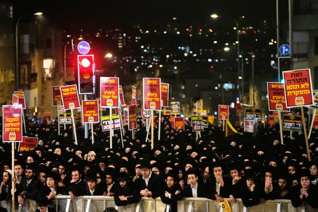 <p>Ultra-Orthodox Jewish men protest against army recruitment in Jerusalem, Tuesday, Jan. 6, 2026. (AP Photo/Ohad Zwigenberg)</p>