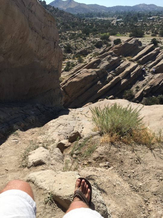 The runner-up prize went to a traveler who had a panic attack when he scaled a rock-face in California in flip-flops (pictured)