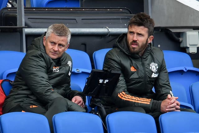 Ole Gunnar Solskjaer, left, and Michael Carrick are set to hold further talks with Manchester United later this week over becoming interim head coach (Glyn Kirk/PA)