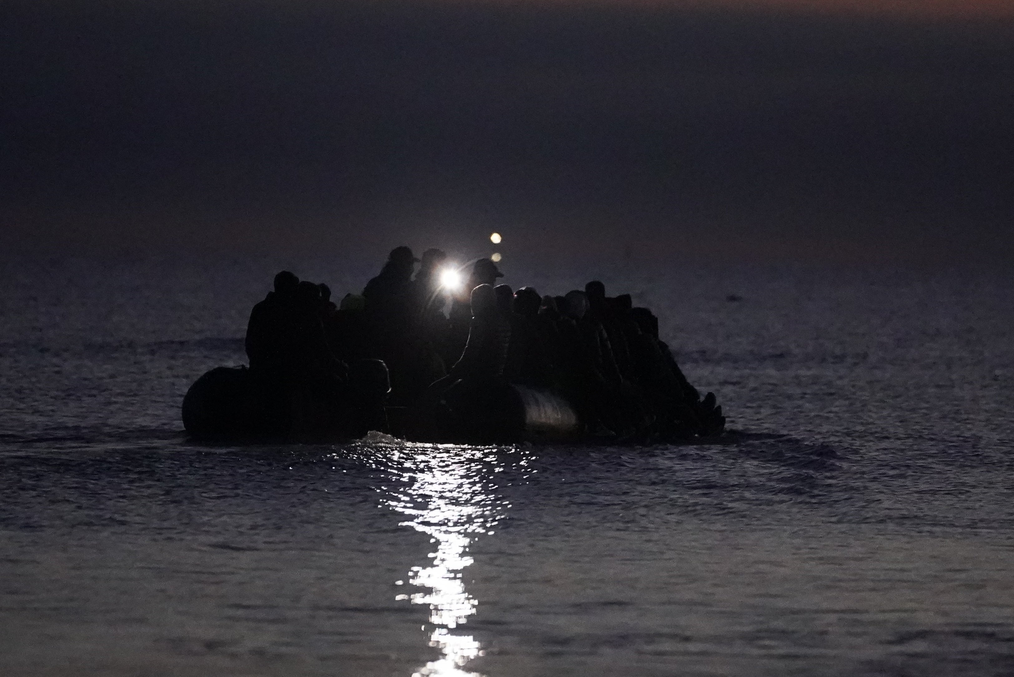 <p>Members of the ‘Raise the Colours’ group have been accused of destroying small boats used by migrants attempting to reach the UK</p>