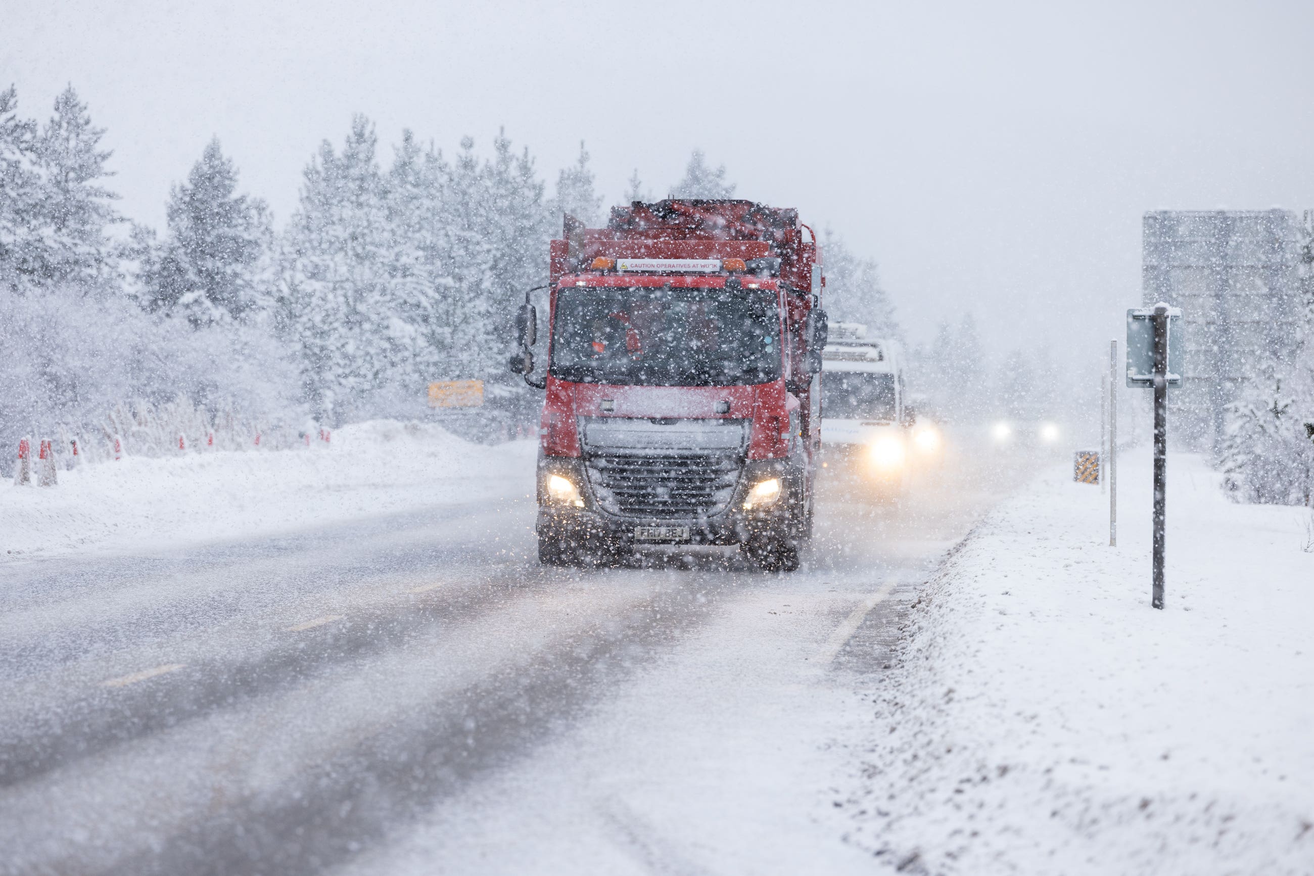 Traffic on the A9 as heavy snow continues to cause disruption to many parts of the Highlands (Paul Campbell/PA)