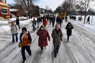 Demonstrators in Minneapolis gather near the scene where an ICE officer fatally shot a woman