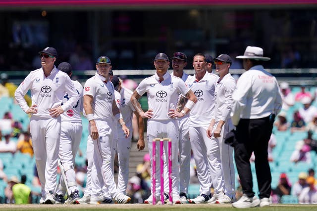 England players look dejected and confused after an unsuccessful review for caught behind (Robbie Stephenson/PA)