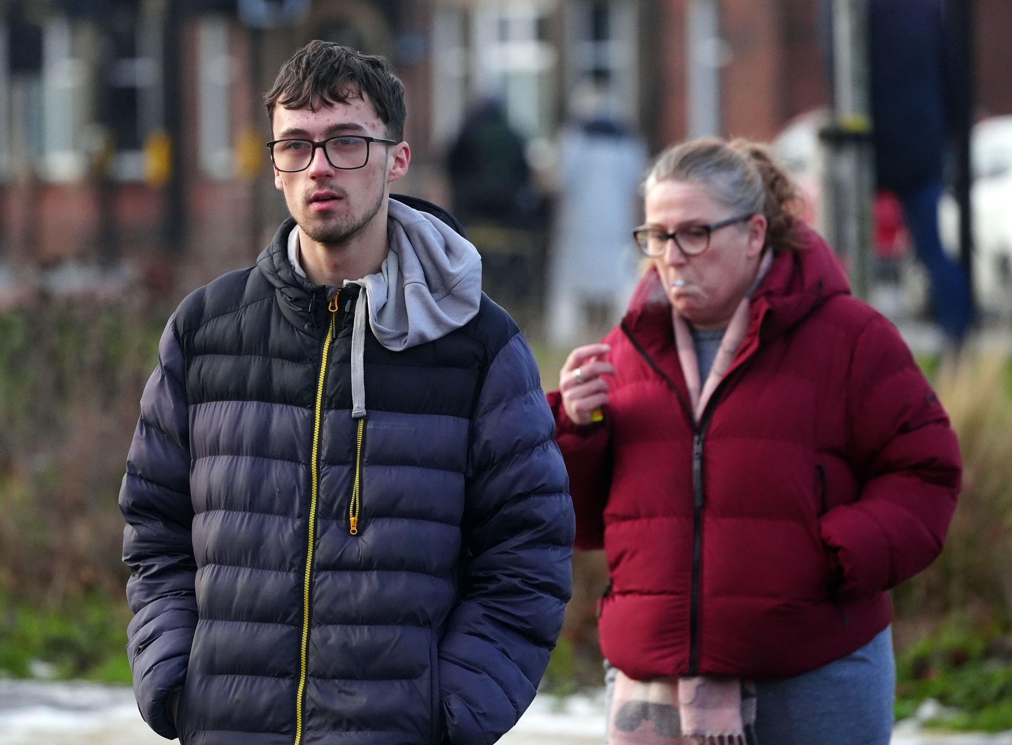 Danielle Johnson and Louis Casson, the mother and brother of Leah Casson who died in a blaze at her home in Vicarage Street, North Shields (PA)