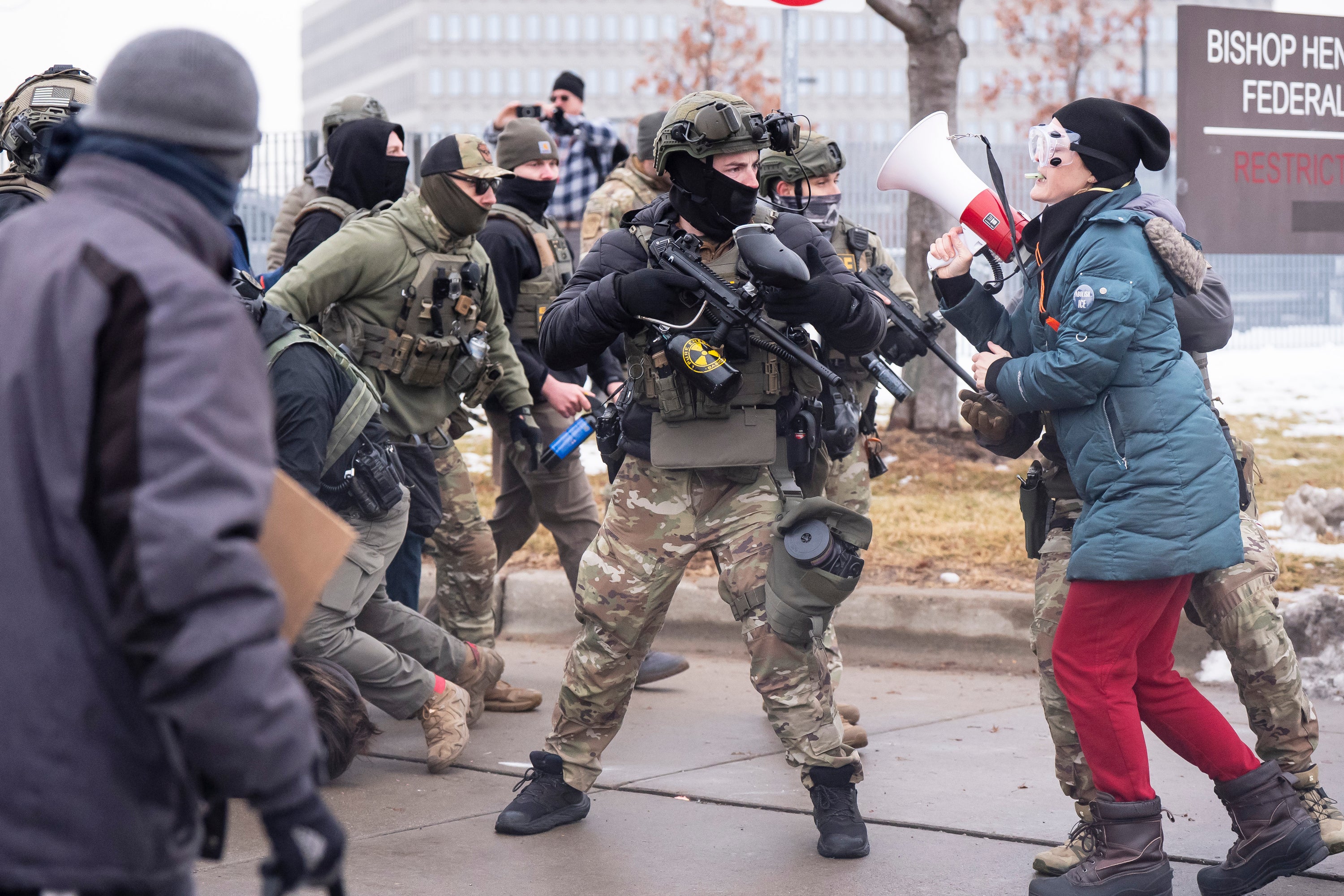 <p>Police and protesters clash in Minneapolis on Thursday</p>