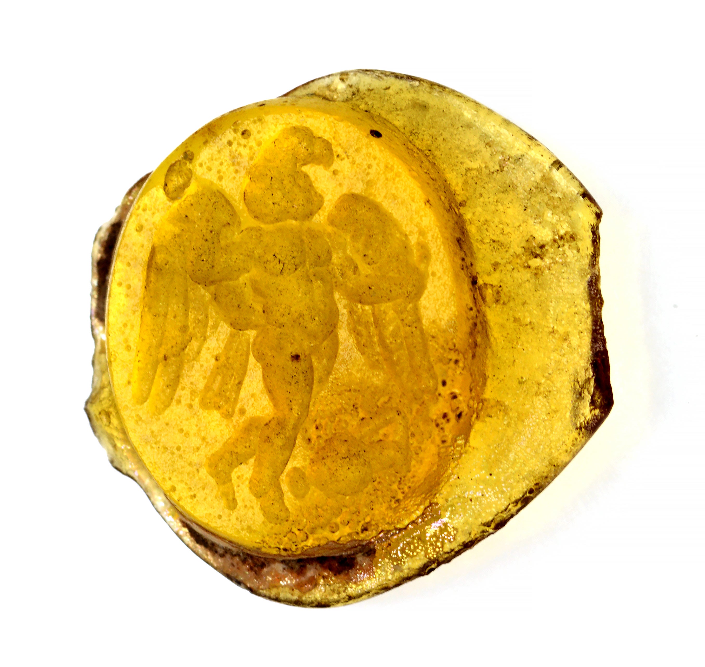 Another gem recovered is this ancient glass intaglio with Jupiter as an eagle abducting Ganymede Roman. It dates to between 1st Century BC and 1st Century AD