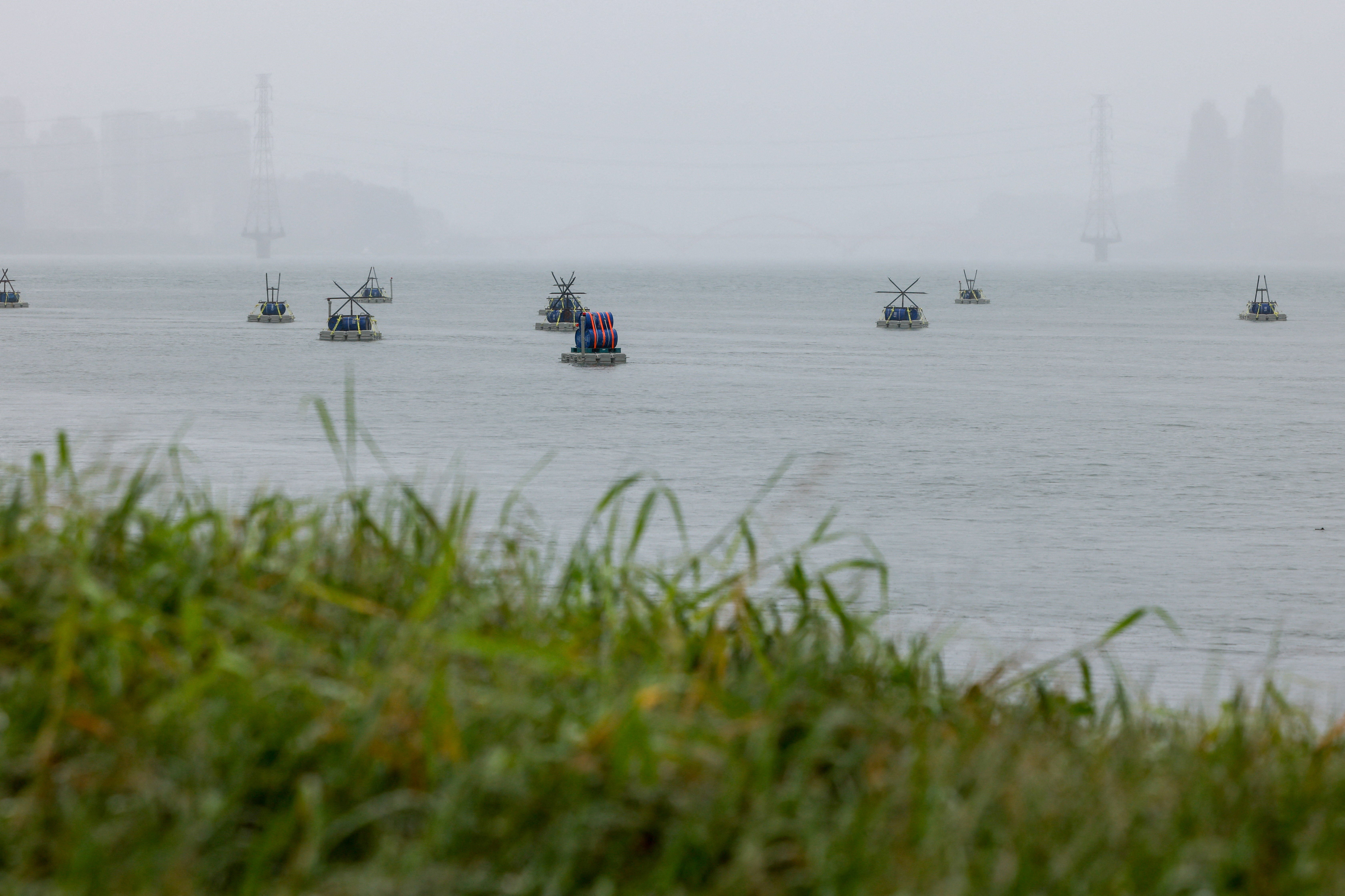 <p>Explosive barrels placed by Taiwan military at the Tamsui River as part of a  series of emergency combat readiness drills in Taipei</p>