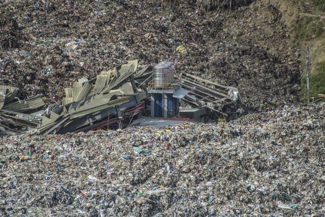 <p>An aerial view shows a landslide at the landfill in Barangay Binaliw, Cebu City, on 9 January 2026</p>