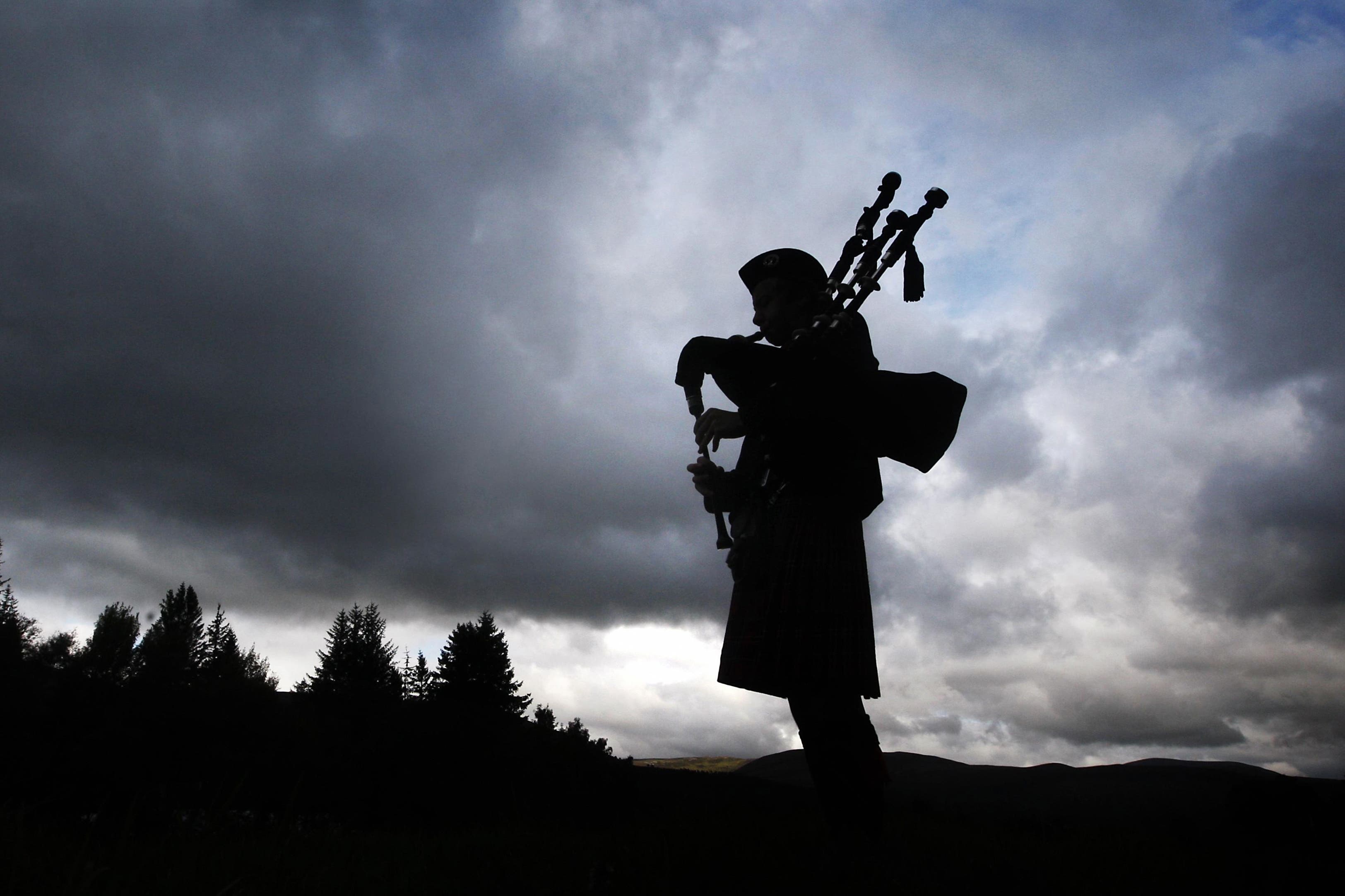 The original poster plays bagpipes across many countries (Danny Lawson/PA)