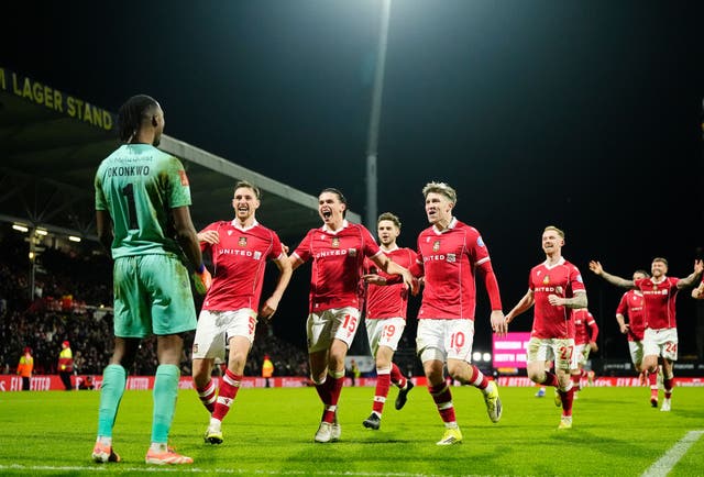 <p>Wrexham goalkeeper Arthur Okonkwo saved two penalties in the shootout</p>