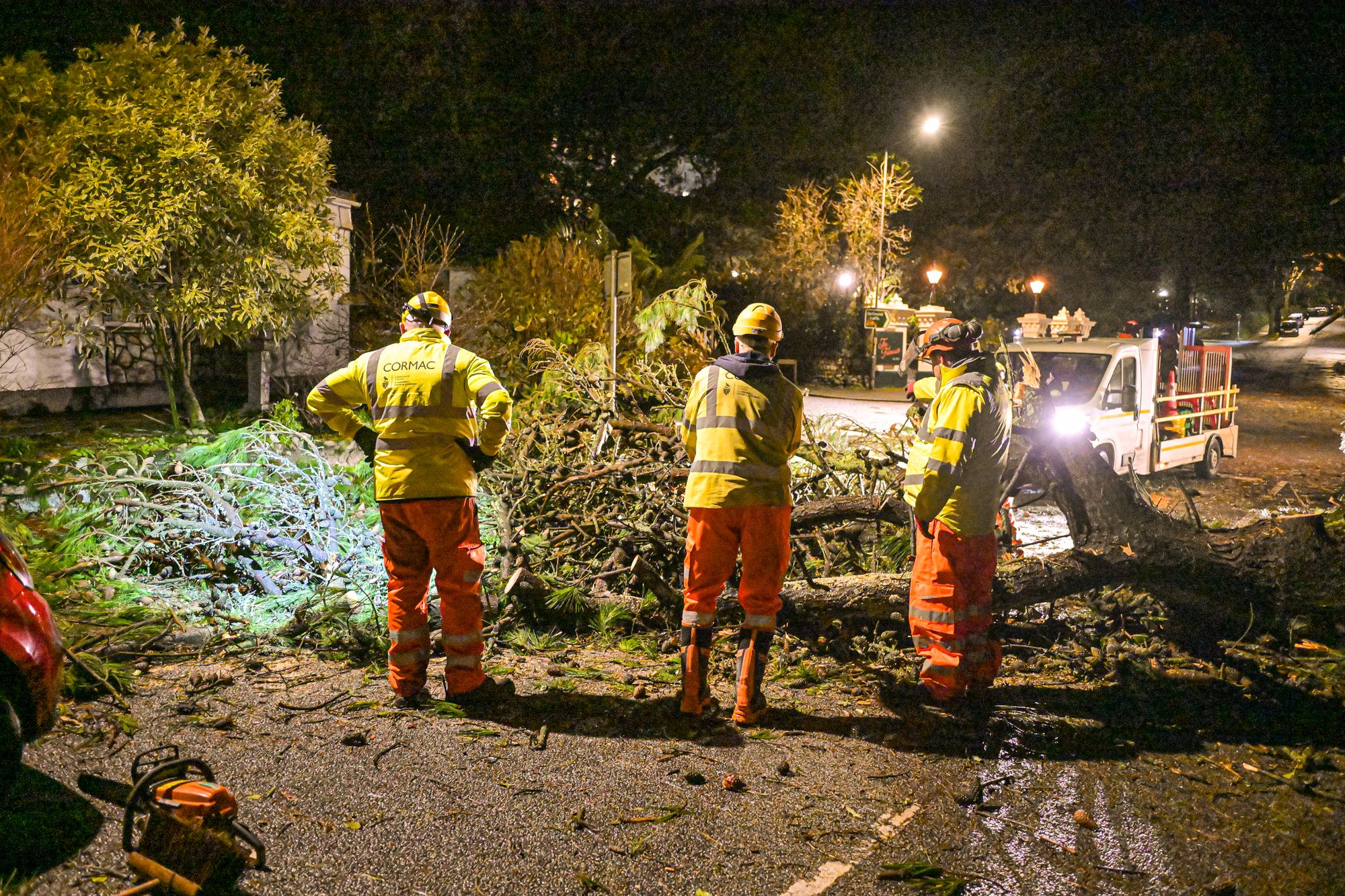 Council workers clear fallen trees from a road after Storm Goretti passed through at night on 8 January 2026 in Falmouth, Cornwall, England