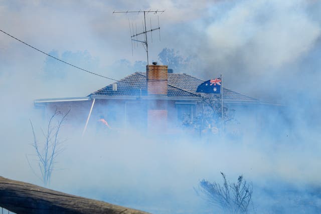 <p>A burning home in Longwood in Victoria, Australia </p>