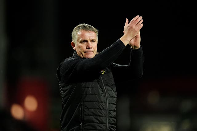 Manager Phil Parkinson applauds Wrexham fans ahead of their FA Cup third-round tie against Nottingham Forest (Martin Rickett/PA)