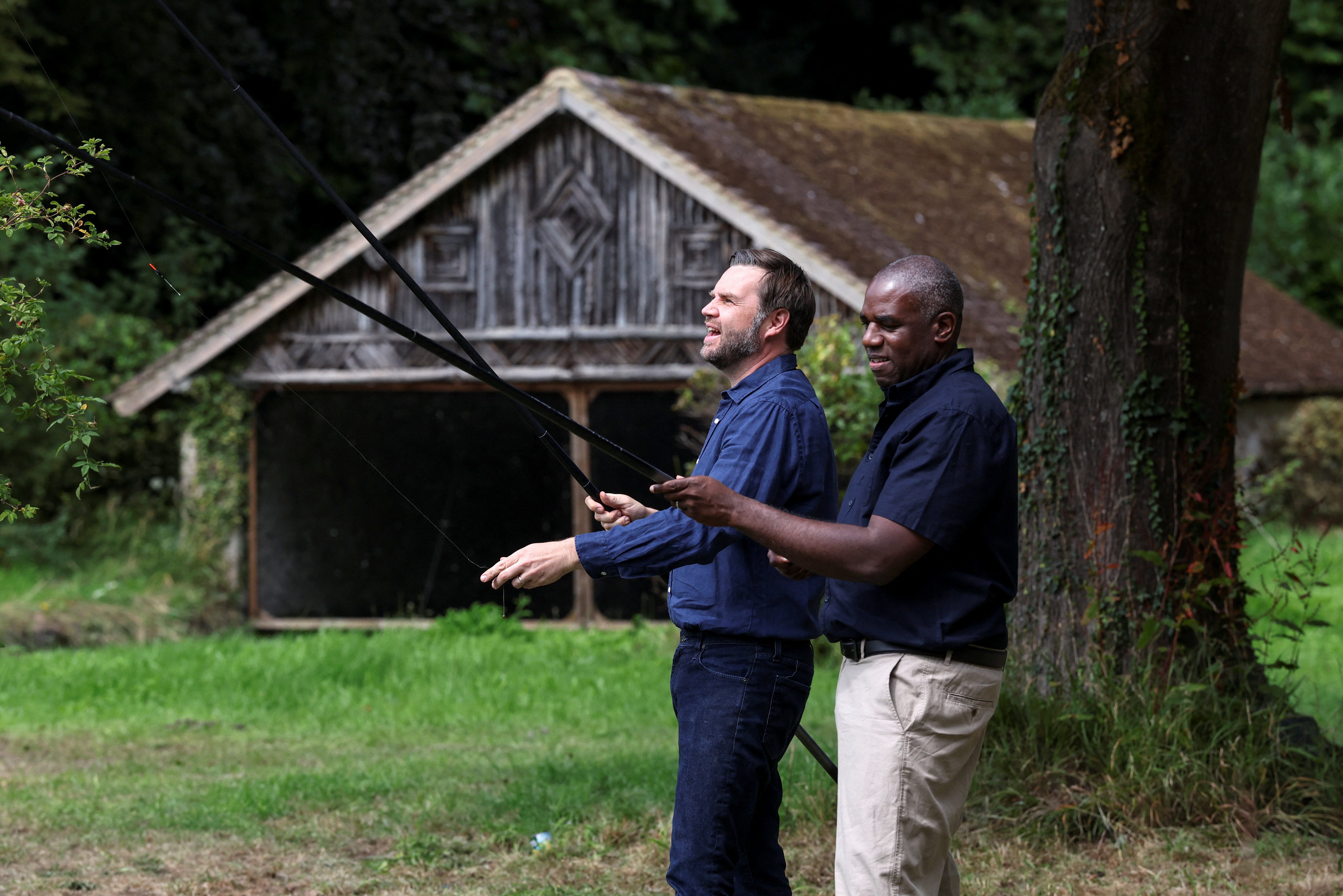 Foreign Secretary David Lammy fishes with US vice president JD Vance at Chevening House in Kent. (Suzanne Plunkett/PA)