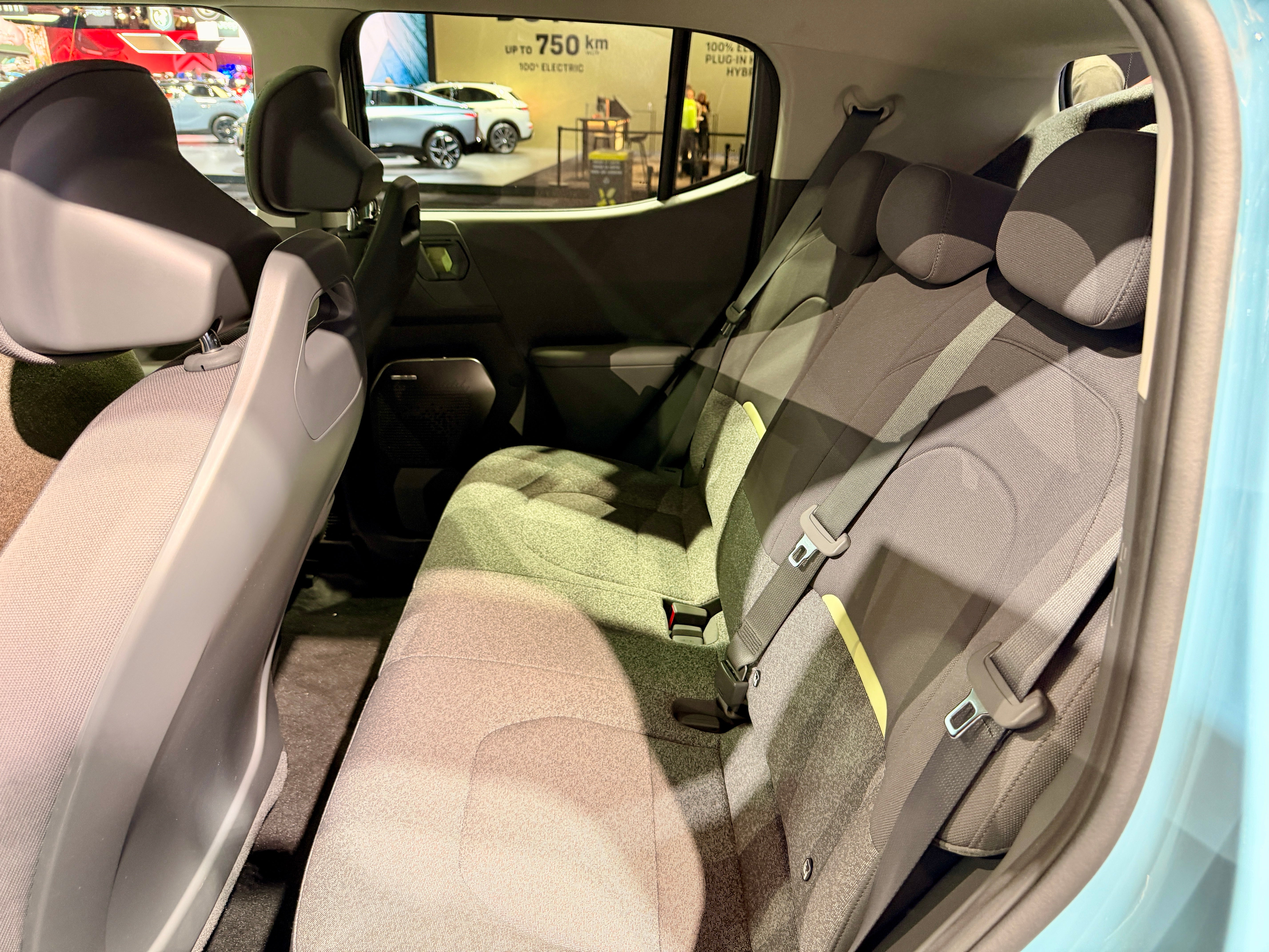 The Kia EV2's rear seats slide forward to increase boot space. And you can choose between two or three seats in the back