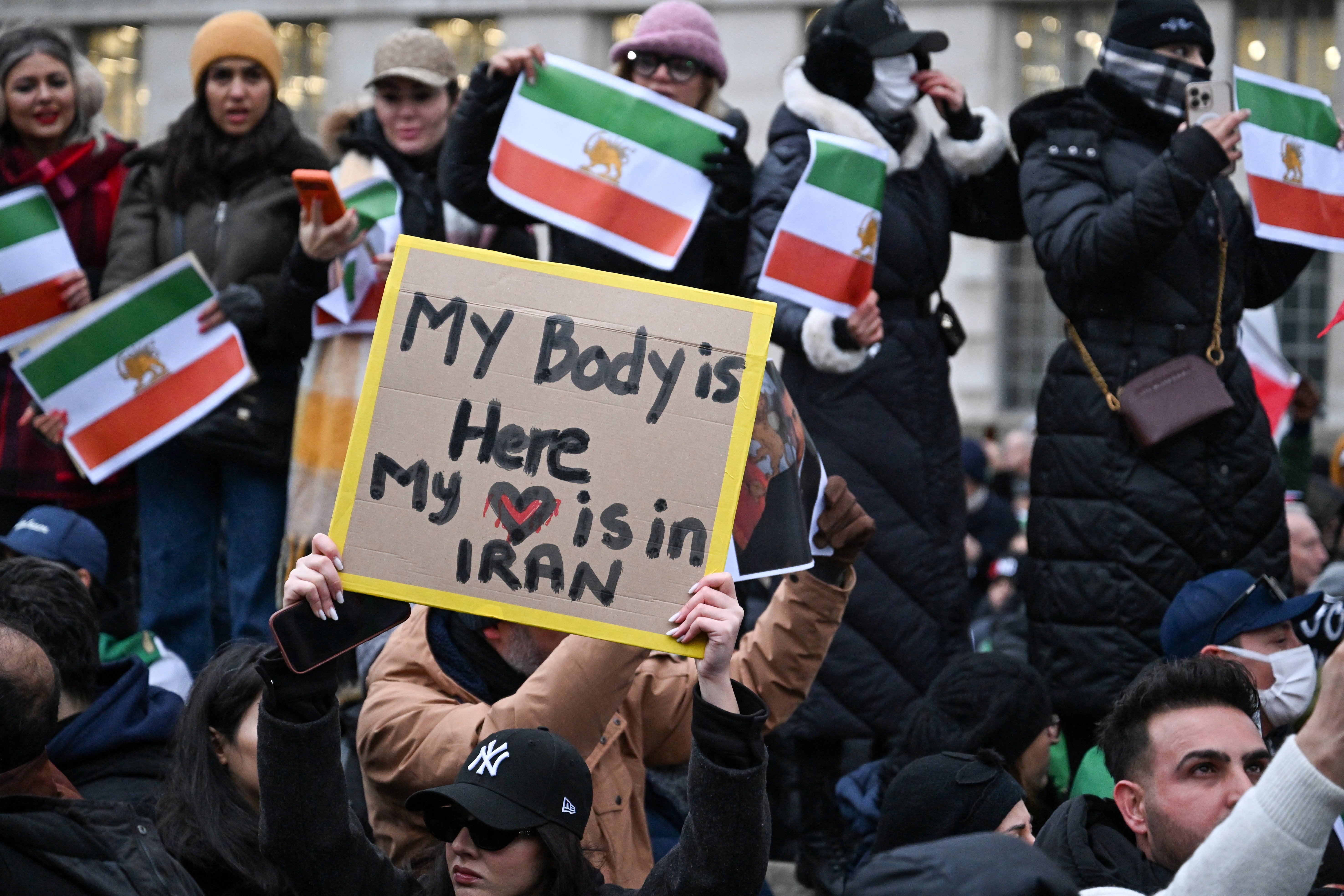 <p>Demonstrators attend a protest in support of the Iranian people outside Downing Street in London</p>