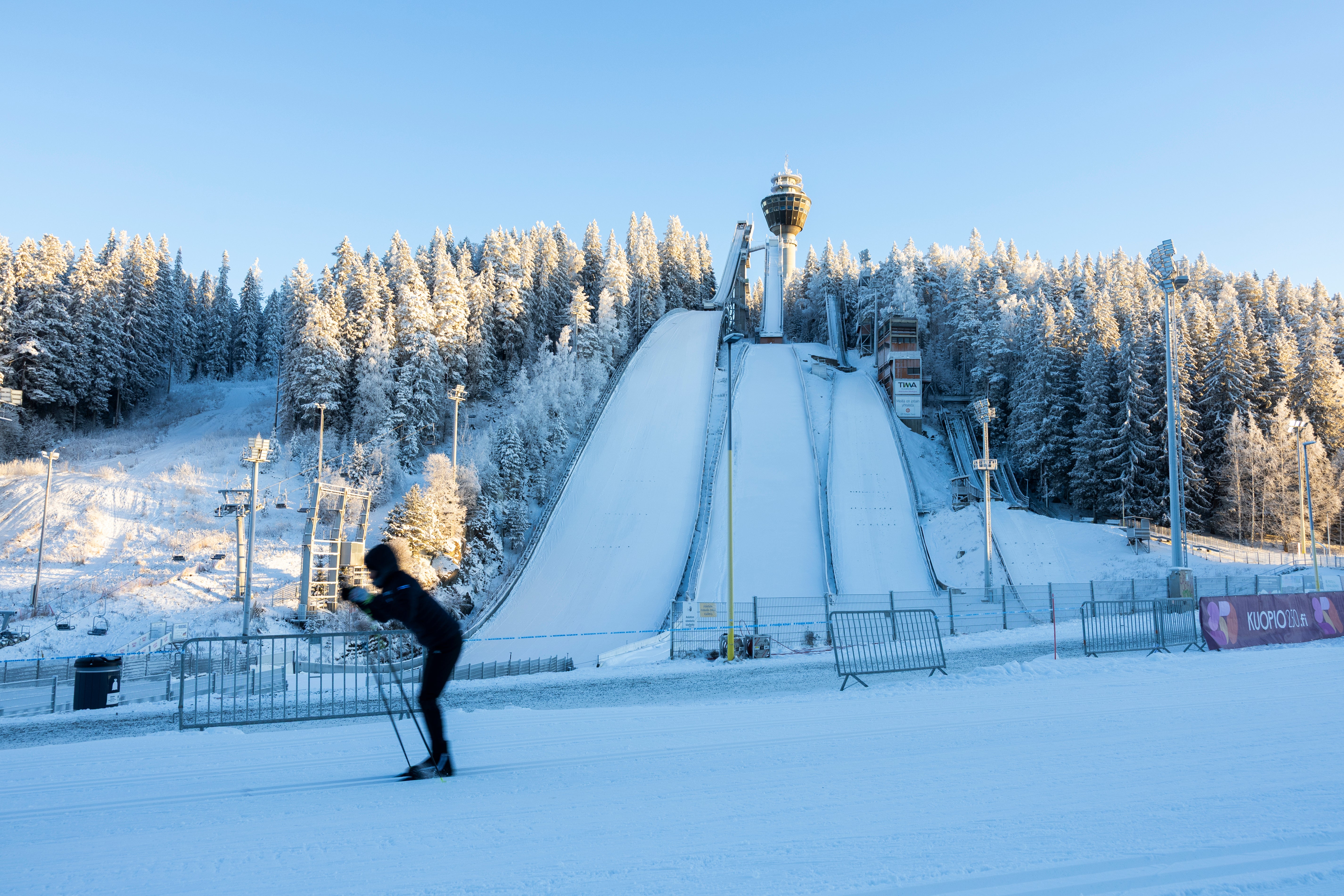 Athletes ski despite the severe frost at the Puijo Ski Stadium in Kuopio, Finland, Friday, Jan. 9, 2026. (Matias Honkamaa/Lehtikuva via AP)