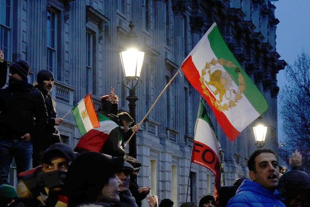People taking part in a protest in Whitehall, central London, to show solidarity with the protests in Iran (Ben Bauer/PA)