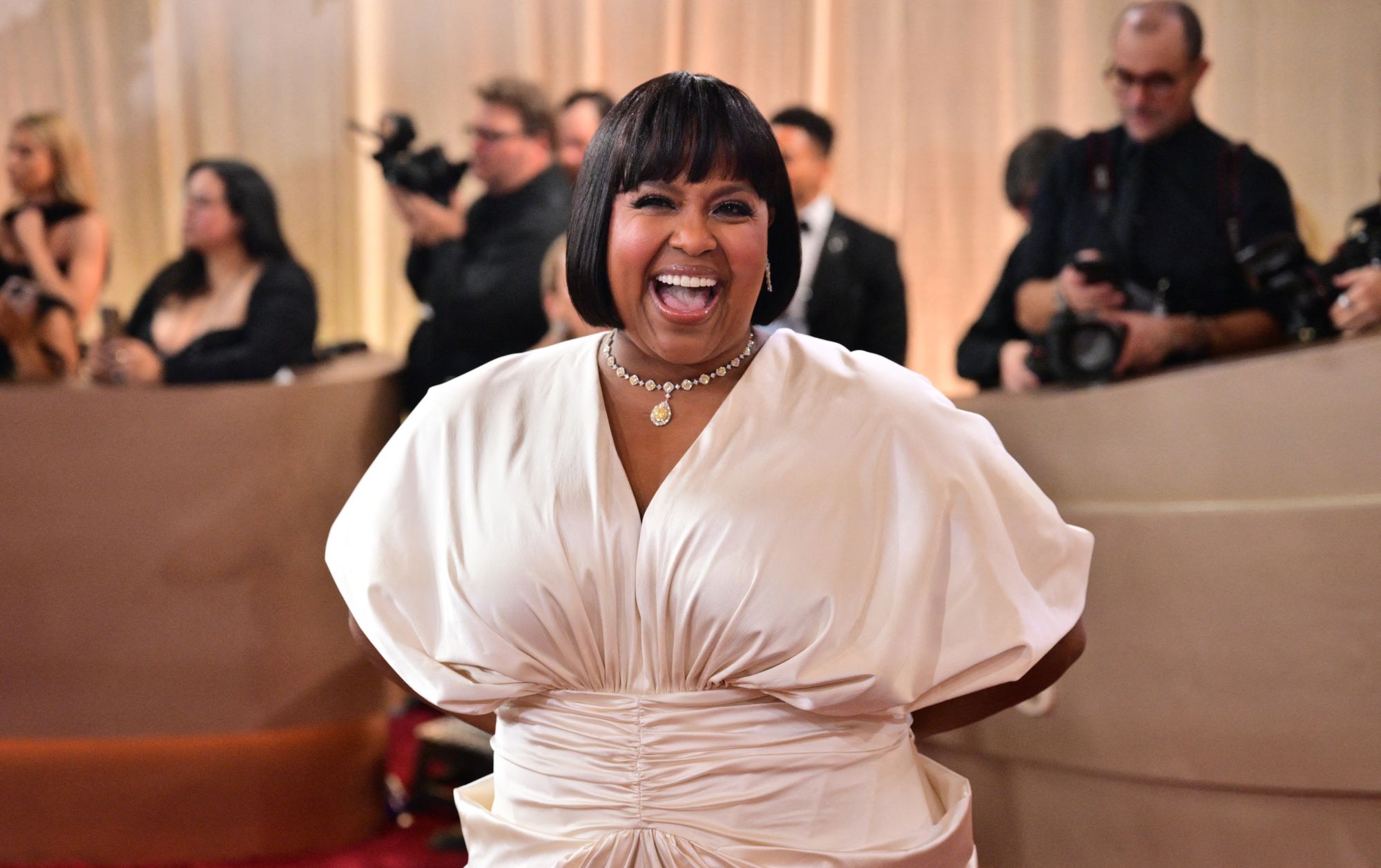 The actor’s dress drew attention away from her stylish blunt bob and diamond necklace