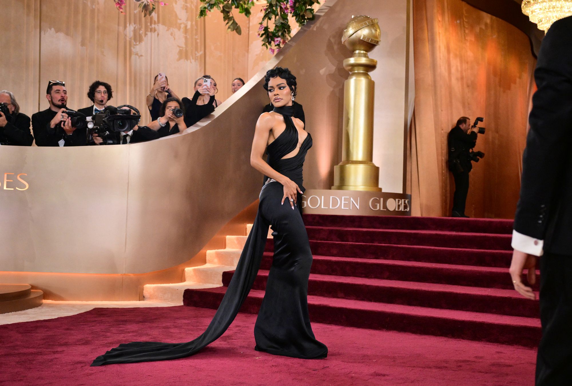 Teyana Taylor showed up to the Golden Globes wearing a black Schiaparelli gown with various cutouts that left little to the imagination