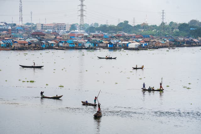 <p>Fishermen in the lagoon in Lagos, Nigeria, on Saturday, Dec. 6, 2025. (AP Photo/Grace Ekpu)</p>