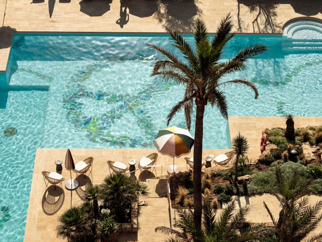 <p>The spacious pool sits in the middle of Bikini Hotel’s gardens, just a stone’s throw from the Mediterranean Sea</p>
