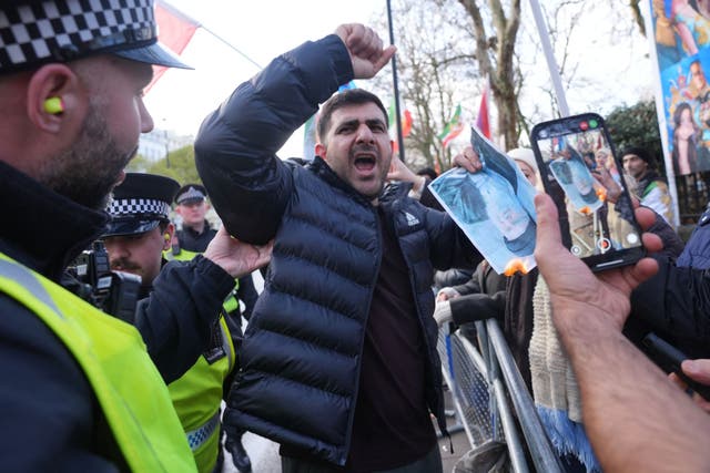 <p>Metropolitan Police arrested 14 people on suspicion of offences including violent disorder and trespass after protests outside Iran’s London embassy turned violent. </p>