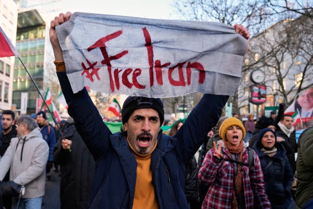 <p>Protesters participate in a demonstration in Berlin, Germany, in support of the nationwide mass protests in Iran</p>