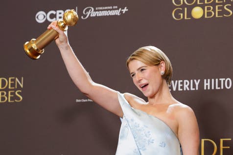 <p>Jessie Buckley, star of Hamnet, holding her Golden Globe</p>