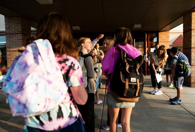 <p>Minnesota students arrive for the first day of school in September. Researchers say teens and adolescents who are exposed to forever chemicals have a higher risk of developing chronic liver disease</p>