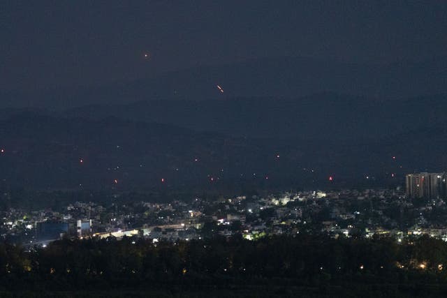 <p>File. Streaks of light illuminate the sky as Indian air defence systems engage suspected Pakistani drones in Jammu on 10 May 2025</p>