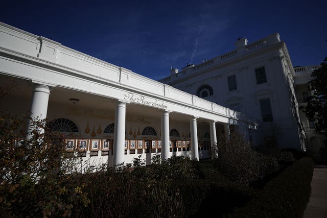<p>The sign, which says “The Rose Garden” in an elegant script, appeared on the White House colonnade on Tuesday, according to several reporters. </p>