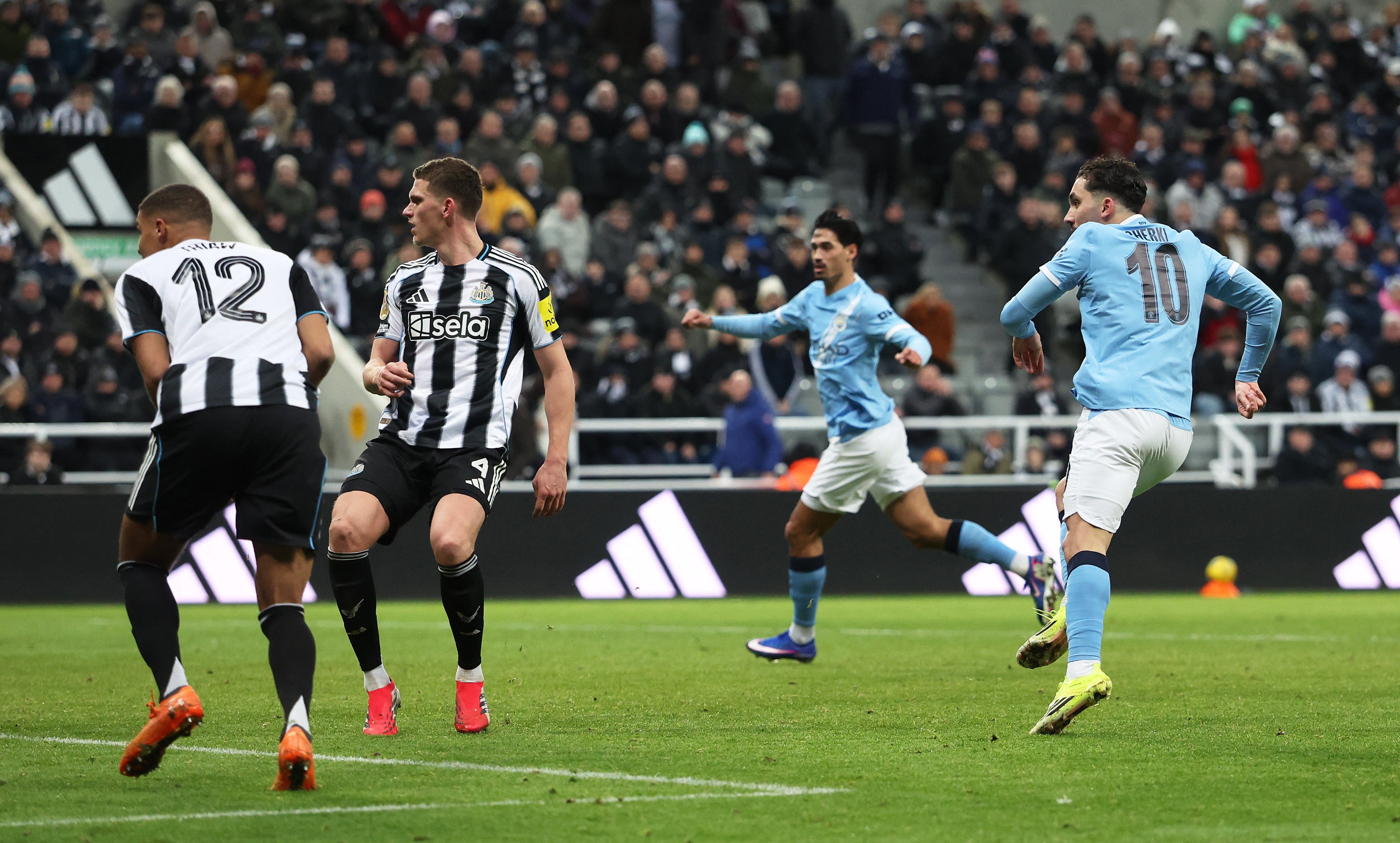 Rayan Cherki struck a blow late in stoppage time as Man City won the game 2-0